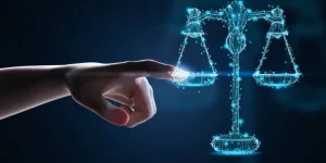 istockphoto-1215416007-612×612-1 Internet law concept with 3d rendering human finger point at law scale digital display